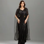 Black Pearll Black Designer Lycra Saree with Embellished Sequin Blouse | Premium Party Wear Saree for WomenTurn heads with the timeless elegance of the Black Pearll Black Designer Lycra Saree, a perfect blend of sophistication and modern glamour. Crafted from premium-quality Lycra fabric, this saree features a graceful fluid drape that enhances your silhouette while ensuring all-day comfort. The highlight of this ensemble is its stunning heavily embellished sequin blouse with intricate beadwork and stylish fringe detailing, adding a luxurious touch to your festive and party wardrobe.  The classic solid black saree paired with the designer blouse creates a chic and elegant look, making it ideal for weddings, receptions, cocktail parties, engagement ceremonies, festive celebrations, anniversary events, evening functions, and special occasions. Whether styled with statement jewellery or minimal accessories, this saree effortlessly delivers a sophisticated and fashionable appearance.  Upgrade your ethnic collection with this premium Black Pearll creation that perfectly combines traditional elegance with contemporary style.