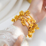 Gold Ghungroo Cluster Statement Bangles Set