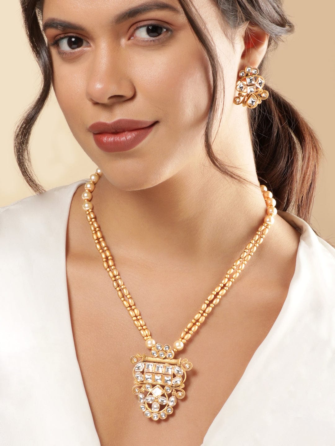 Golden Silhouette in Ivory Kundan Necklace Set