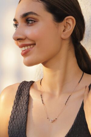 Gold Toned Mangalsutra With American Diamond Zirconia